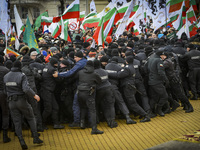 Protesters clash with police as they try to enter Bulgarian parliament building during protest against green certificates and vaccinations o...