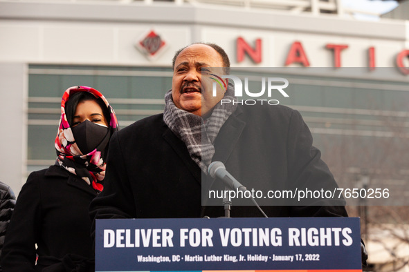 Martin Luther King III speaks during the DC Peace Walk for voting rights.  Martin Luther King III, Arndrea Waters King, and Yolanda Renee Ki...