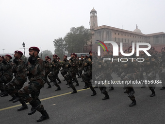 Indian Army's Para SF (Special Forces) practise march during the rehearsals for the upcoming Republic Day parade on a foggy winter morning,...