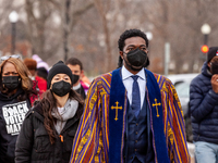 Reverend Stephen A. Green and Joceline Garcia lead a group of faith leaders and students on hunger strike sit on the steps of the Senate cha...