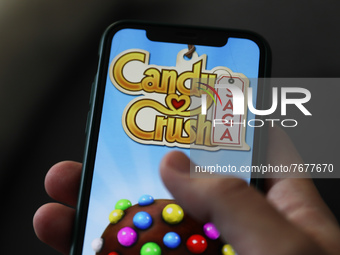 Candy Crush Saga logo displayed on a phone screen is seen in this illustration photo taken in Krakow, Poland on January 23, 2022. (