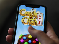 Candy Crush Saga logo displayed on a phone screen is seen in this illustration photo taken in Krakow, Poland on January 23, 2022. (