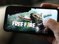Garena Free Fire logo displayed on a phone screen is seen in this illustration photo taken in Krakow, Poland on January 23, 2022. (