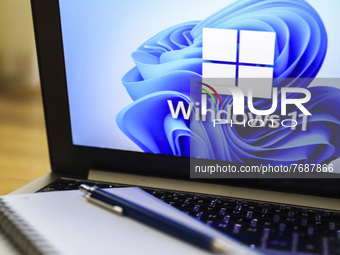 Windows 11 operating system logo is displayed on a laptop screen for illustration photo. Gliwice, Poland on January 23, 2022. (