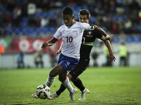 Cape Verde´s forward Heldon (L) vies with Portugal´s defender Cedric Soares during the Portugal vs Serbia friendly football match at Antonio...