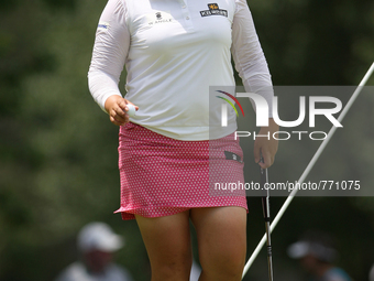 Inbee Park of Seoul, South Korea walks off the 5th green after making her putt during the third round of the Marathon LPGA Classic golf tour...