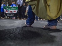 Participants in the march in favor of women and men barefoot. Milan September 11, 2015. (