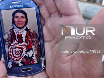 One of the few treasures the migrants have is their mobile phone. MIgrants are eager to show pictures of their loved ones back in Syria, Pak...