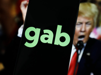 The Gab alt-tech social media logo with an image of former US president Donald Trump is seen in this photo illustration in Warsaw, Poland on...