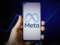The Meta Platfroms logo is seen on a mobile deviece in this photo illustration in Warsaw, Poland on 23 February, 2022. (