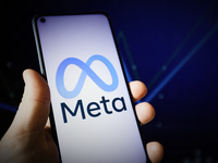 The Meta Platfroms logo is seen on a mobile deviece in this photo illustration in Warsaw, Poland on 23 February, 2022. (