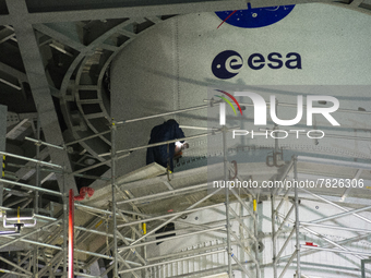 A NASA worker workes on the Artemis 1 European Space Module (ESM), will send the spacecraft and support the crews beyond the Moon and back....
