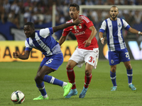 Porto's French midfielder Giannelli Imbula and Benfica's Portuguese defender André Almeida in action during the Premier League 2015/16 match...