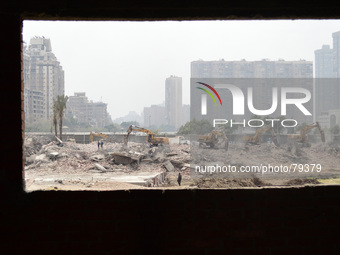 Egypt's government demolishing buildings in Maadi, Egypt, on April 9, 2014. (
