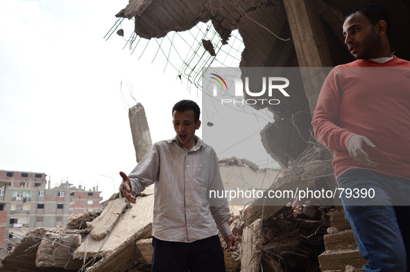 Egypt's government demolishing buildings in Maadi, Egypt, on April 9, 2014. 