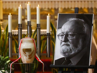 The urn with ashes and a photo of Polish composer and conductor Krzysztof Penderecki is seen during a burial service at St. Florian's Church...