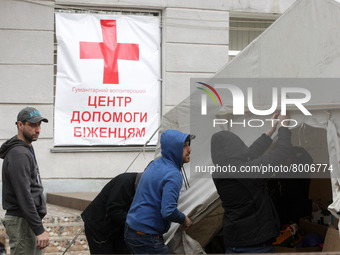 Ukrainian volunteers work at the city humanitarian volunteer center for helping refugees, amid Russia's invasion of Ukraine, at the city of...
