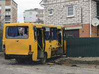 Destroyed civil vehicle  near a damaged residential building in the recaptured by the Ukrainian army Bucha city near Kyiv, Ukraine, 04 April...