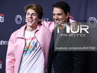 Jacob Bertrand and Ralph Macchio arrive at the 2022 PaleyFest LA - Netflix's 'Cobra Kai' held at the Dolby Theatre on April 8, 2022 in Holly...
