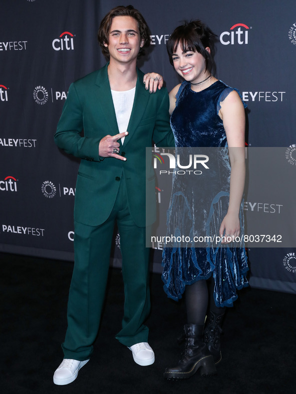 Tanner Buchanan and Mary Mouser arrive at the 2022 PaleyFest LA - Netflix's 'Cobra Kai' held at the Dolby Theatre on April 8, 2022 in Hollyw...