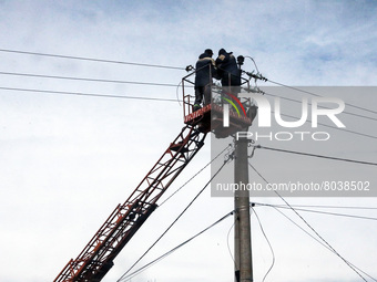 KYIV REGION, UKRAINE - Communal workers repair power lines in the city liberated from the russian occupiers, Hostomel, Kyiv Region, north-ce...