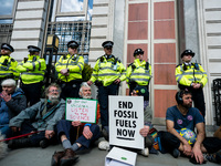 Extinction Rebellion protesters gather to begin their Spring 2022 UK Action in London, Britain, 9 April 2022. Thousands supporters of the pr...