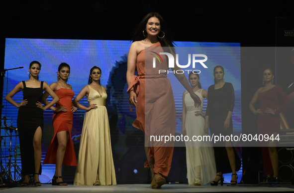 A tollywood actress Priyanka Sarkar walks as a show stopper during a fashion show in Kolkata, India, 09 April, 2022.  