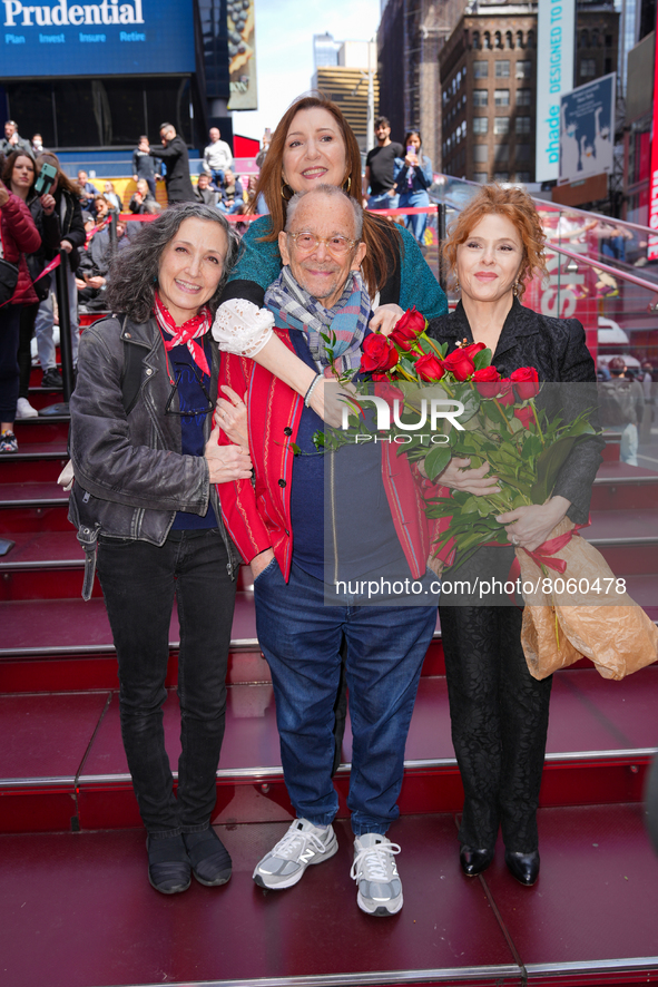 Joel Grey poses at his 90th birthday celebration at Times Square TKTS Red Steps on April 11, 2022 in New York City.  