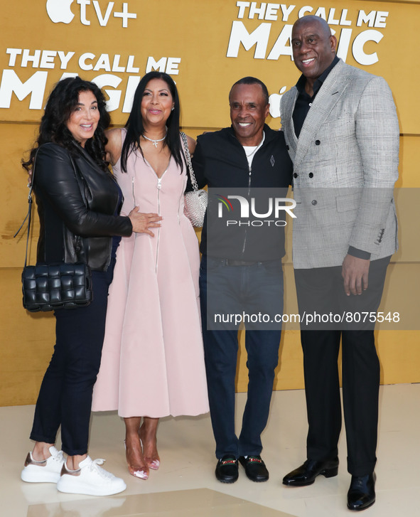 Bernadette Robi, Cookie Johnson, Sugar Ray Leonard and Magic Johnson arrive at the Los Angeles Premiere Of Apple's 'They Call Me Magic' held...