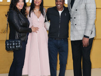 Bernadette Robi, Cookie Johnson, Sugar Ray Leonard and Magic Johnson arrive at the Los Angeles Premiere Of Apple's 'They Call Me Magic' held...