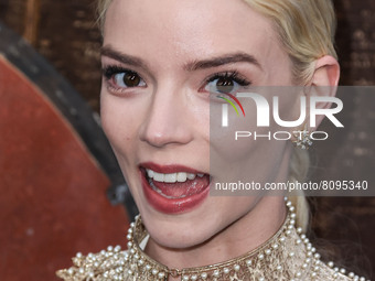 Actress Anya Taylor-Joy wearing a Dior dress and gold collar necklace with a Tiffany and Co. bracelet, rings, and earrings arrives at the Lo...