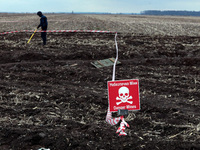 KYIV REGION, UKRAINE - APRIL 21, 2022 - The 'Danger Mines' warning sign is pictured during a mine clearance mission near Bervytsia, a villag...