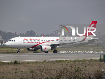 Air Arabia Airbus A320 aircraft as seen taxiing ready to depart for a steep takeoff from Kathmandu KTM Tribhuvan International Airport, capi...