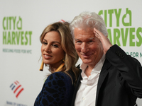 NEW YORK, NEW YORK - APRIL 26: Alejandra Silva and Richard Gere attend the City Harvest Presents The 2022 Gala: Red Supper Club at Cipriani...
