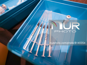  Syringes filled with COVID-19 vaccine sit on a table at a vaccination centre in Doncaster on 28 April. (