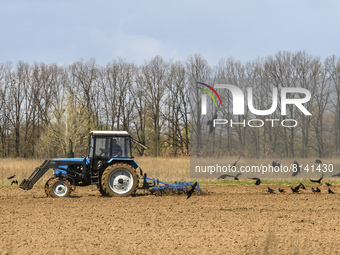Tractor works on a field close to Kolychivka village, Chernihiv area, April 27, 2022. (