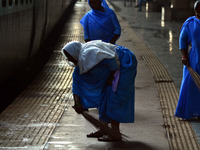 indian  women volunteers sweep in platforms of Allahabad railway station,in Allahabad on october 2,2015.
Thursday marks one year since India...