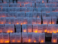 Some of the thousands of paper bags, each bearing the name of a loved one and a candle, covering the steps in front of the Lincoln Memorial...