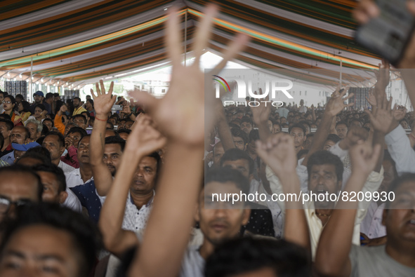 Supporters of Bharatiya Janata Party (BJP) attend in a public rally as Chief minister Himanta Biswa Sarma led alliance Assam Government comp...