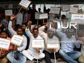 Activists of All India United Democratic Front (AIUDF) and supporters stage a protest against hike in prices of diesel, petrol and other ess...