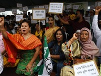 Activists of All India United Democratic Front (AIUDF) and supporters stage a protest against hike in prices of diesel, petrol and other ess...