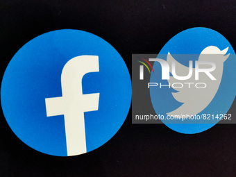 Facebook and Twitter logos are seen during EDP conference 'Solutions For Europe' for the 18th anniversary of Poland joining EU. Krakow, Pola...