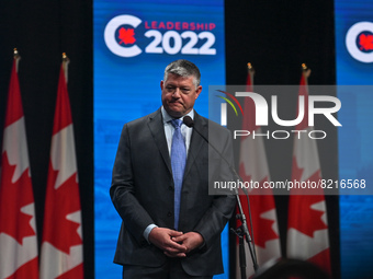 Conservative leadership candidate Scott Aitchison answers journalists' questions at the end of the Conservative Party of Canada English lead...