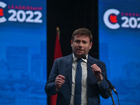 Conservative leadership candidate Roman Baber answers journalists' questions at the end of the Conservative Party of Canada English leadersh...