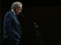 Conservative leadership candidate Jean Charest answers journalists' questions at the end of the Conservative Party of Canada English leaders...