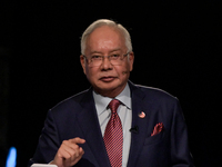 Malaysia's former prime minister Najib Razak debates with opposition leader Anwar Ibrahim in Kuala Lumpur, Malaysia, on May 12, 2022. (