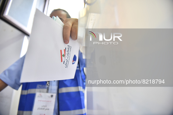   Public officials, who will take charge as pole clerks, cast their votes before the general elections to be held in 16 May Lebanon , Beirut...
