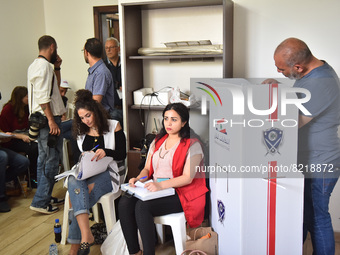 Public officials, who will take charge as pole clerks, cast their votes before the general elections to be held in 16 May Lebanon, Beirut on...