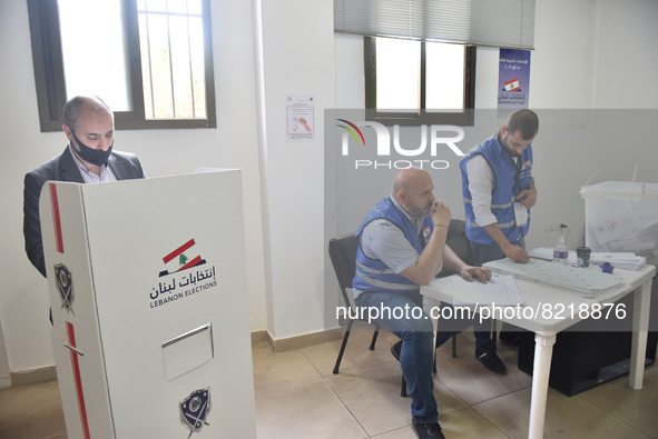 Public officials, who will take charge as pole clerks, cast their votes before the general elections to be held in 16 May Lebanon, Beirut on...