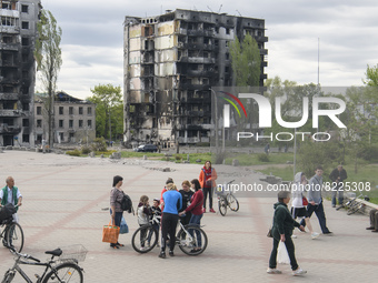 Local residents on the central square of the Borodianka town, Kyiv area, Ukraine May 13, 2022 (